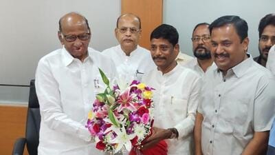 Congress leader Ravindra Dhangekar with Sharad Pawar. (HT PHOTO) Congress leader Ravindra Dhangekar with Sharad Pawar. (HT PHOTO)