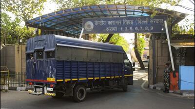 Delhi chief minister Arvind Kejriwal is brought to Tihar Jail in New Delhi on April 1. (PTI) Delhi chief minister Arvind Kejriwal is brought to Tihar Jail in New Delhi on April 1. (PTI)