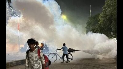 Fogging using a cycle-mounted machine being carried out in Prayagraj. (HT File)