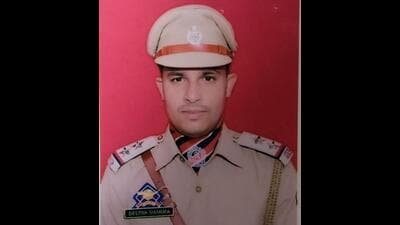 Jammu and Kashmir Police probationary sub inspector Deepak Sharma, who was injured in a shootout with gangsters in Kathua on Tuesday night, succumbed to his injuries on Wednesday. (File photo) Jammu and Kashmir Police probationary sub inspector Deepak Sharma, who was injured in a shootout with gangsters in Kathua on Tuesday night, succumbed to his injuries on Wednesday. (File photo)