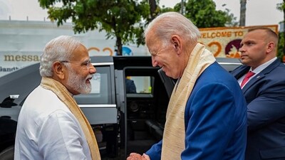 Prime Minister Narendra Modi with US President Joe Biden at Mahatma Gandhi's memorial Rajghat on the final day of the G20 Summit, in New Delhi (PTI)