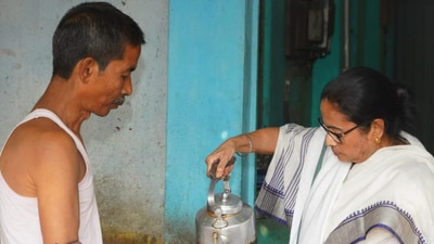 In a series of photographs shared on TMC's official social media platforms, Banerjee was captured participating in tea making and serving it to the workers. (X/TMC)