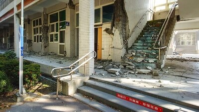 The national legislature, a converted school built before World War II, also suffered damage to walls and ceilings. (AFP) The national legislature, a converted school built before World War II, also suffered damage to walls and ceilings. (AFP)