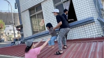 Taiwan earthquake: Residents started a recue operation and rescue a child from a partially collapsed building in Hualien. The head of Taiwan's earthquake monitoring bureau, Wu Chien-fu, said effects were detected as far away as Kinmen, a Taiwanese-controlled island off the coast of China. Multiple aftershocks were felt in Taipei in the hour after the initial quake. (TVBS via AP) (AP) Taiwan earthquake: Residents started a recue operation and rescue a child from a partially collapsed building in Hualien. The head of Taiwan's earthquake monitoring bureau, Wu Chien-fu, said effects were detected as far away as Kinmen, a Taiwanese-controlled island off the coast of China. Multiple aftershocks were felt in Taipei in the hour after the initial quake. (TVBS via AP) (AP)