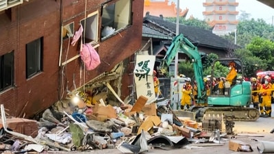 Rescue workers search for survivors at the damaged Uranus Building in Hualien, after a major earthquake hit Taiwan's east. (AFP) Rescue workers search for survivors at the damaged Uranus Building in Hualien, after a major earthquake hit Taiwan's east. (AFP)