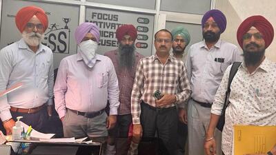 The accused, Dr Kawaljit Singh, a PCMS doctor, in the custody of Punjab vigilance bureau on Wednesday. (HT Photo)
