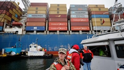 Journalists, members of the U.S. Army Corps of Engineers and crew members of the Survey Vessel Catlett survey the damage done to the cargo ship Dali one week after it collided with and destroyed the Francis Scott Key Bridge on April 02, 2024 in Baltimore, Maryland. (Getty Images via AFP) Journalists, members of the U.S. Army Corps of Engineers and crew members of the Survey Vessel Catlett survey the damage done to the cargo ship Dali one week after it collided with and destroyed the Francis Scott Key Bridge on April 02, 2024 in Baltimore, Maryland. (Getty Images via AFP)