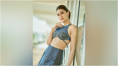Kriti accessorised the ensemble with pointed denim stilettos from Zara, metallic round stud earrings, and statement rings. Lastly, she chose darkened brows, mascara on the lashes, subtle smoky eye shadow, rouge on the cheekbones, glossy pink lip shade, and highlighter on the contours. Centre-parted messy ponytail and metallic pink nail paint rounded it off. (Instagram) Kriti accessorised the ensemble with pointed denim stilettos from Zara, metallic round stud earrings, and statement rings. Lastly, she chose darkened brows, mascara on the lashes, subtle smoky eye shadow, rouge on the cheekbones, glossy pink lip shade, and highlighter on the contours. Centre-parted messy ponytail and metallic pink nail paint rounded it off. (Instagram)