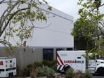 Armored trucks are parked outside the GardaWorld facility in the Sylmar section of Los Angeles on Thursday, April 4, 2024. Thieves stole as much $30 million in an Easter Sunday burglary at a Los Angeles money storage facility in one of the largest cash heists in city history. (AP Photo/Richard Vogel) Armored trucks are parked outside the GardaWorld facility in the Sylmar section of Los Angeles on Thursday, April 4, 2024. Thieves stole as much $30 million in an Easter Sunday burglary at a Los Angeles money storage facility in one of the largest cash heists in city history. (AP Photo/Richard Vogel)