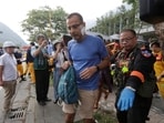 A trapped tourist of Taroko National Park walks to an ambulance after being rescued in Hualien County, eastern Taiwan, Thursday. A trapped tourist of Taroko National Park walks to an ambulance after being rescued in Hualien County, eastern Taiwan, Thursday.