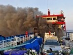 Smoke rises from a ferry in Surat Thani province, Thailand. (AP)