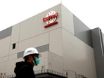 A logo of taiwanese chip giant TSMC is seen at southern Taiwan science park in Tainan, Taiwan. A logo of taiwanese chip giant TSMC is seen at southern Taiwan science park in Tainan, Taiwan.