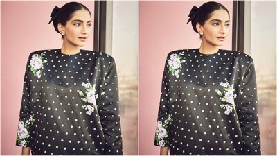 Assisted by her talented fashion stylist sister Rhea Kapoor, Sonam accessorised her look with a pair of diamond stud earrings, a black Dior mini bag and a pair of black pumps to perfectly complement her elegant look.&nbsp; (Instagram/@sonamkapoor)