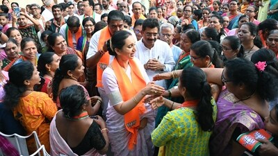 Mormugao, Apr 04 (ANI): BJP's South Goa Candidate Pallavi Dempo along with Goa BJP President Sadanand Shet Tanavade, Ashish Sood (Goa Elections observer) meet people after addressing BJP activists at Murmagao on Thursday. (ANI Photo) (Atish Naik) Mormugao, Apr 04 (ANI): BJP's South Goa Candidate Pallavi Dempo along with Goa BJP President Sadanand Shet Tanavade, Ashish Sood (Goa Elections observer) meet people after addressing BJP activists at Murmagao on Thursday. (ANI Photo) (Atish Naik)