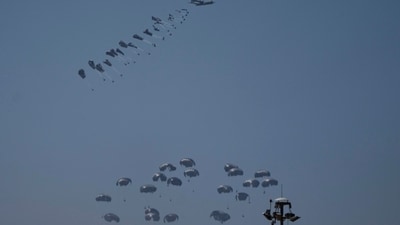 An aircraft airdrops humanitarian aid over northern Gaza Strip as seen from southern Israel, Thursday, April 4, 2024. AP/PTI(AP04_04_2024_000298A) (AP)