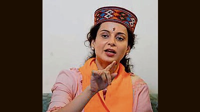 BJP candidate from Mandi Kangana Ranaut addressing a gathering in the Sundernagar assembly segment in Mandi on Thursday. (Birbal Sharma/HT)