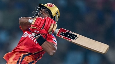 Sikandar Raza was dropped twice in Umesh Yadav's 11th over, albeit both were difficult chances. But it was Shashank who capitalised on the lives, clobbering Umesh for two boundaries and a six to pick up 17 runs in the 11th over. (AFP) Sikandar Raza was dropped twice in Umesh Yadav's 11th over, albeit both were difficult chances. But it was Shashank who capitalised on the lives, clobbering Umesh for two boundaries and a six to pick up 17 runs in the 11th over. (AFP)