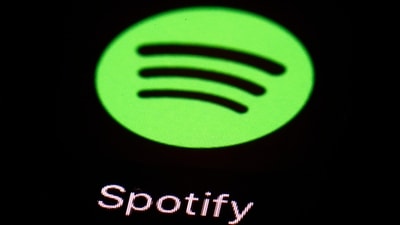 Spotify price hike: The Spotify app is seen on an iPad. The company could introduce a price hike in plans to push profitability as it is expecting strong growth in subscribers.