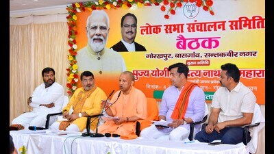 UP CM Yogi Adityanath with Gorakhpur BJP MP Ravi Kishan, Sant Kabir Nagar MP Praveen Nishad and Bansgaon MP Kamlesh Paswan in Gorakhpur on April 4. (HT photo)