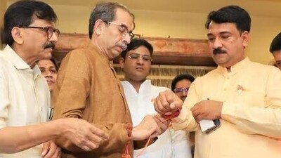 Unmesh Patil with Thackeray and Sanjay Raut Unmesh Patil with Thackeray and Sanjay Raut