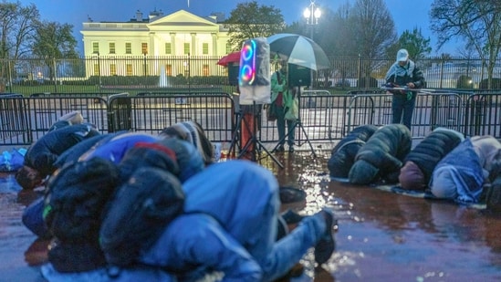 Protesters pray during a demonstration in support of Palestinians, Tuesday, April 2, 2024, at Lafayette Park across from the White House in Washington,. AP/PTI(AP04_03_2024_000011B) (AP)
