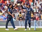 Gujarat Titans' captain Shubman Gill and Mohit Sharma celebrate a wicket. Gujarat Titans' captain Shubman Gill and Mohit Sharma celebrate a wicket.