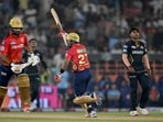 Punjab Kings' Shashank Singh (2R) and Harpreet Brar (L) celebrate their win. Punjab Kings' Shashank Singh (2R) and Harpreet Brar (L) celebrate their win.