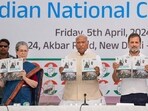 Congress manifesto being released by senior Congress leaders on Friday. (PTI Photo/Ravi Choudhary)