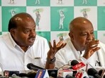 Senior JD(S) leader HD Kumaraswamy with party supremo and former PM Deve Gowda. (PTI) Senior JD(S) leader HD Kumaraswamy with party supremo and former PM Deve Gowda. (PTI)