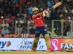 Punjab Kings' Shashank Singh plays a shot during the match against Gujarat Titans in the Indian Premier League (IPL) 2024