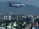 Vistara Flight Disruptions: A Vistara passenger aircraft lands at the Chhatrapati Shivaji International airport in Mumbai, India. The airline, which operates more than 300 flights daily, has cut 20-25 daily flights, Vistara CEO said.