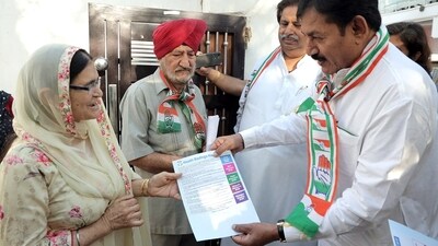 All India Congress Committee (AICC) Jammu & Kashmir in-charge, Bharat Solanki along with party candidate from Jammu constituency, Raman Bhalla distribute leaflets during a door-to-door election campaign, in Jammu, Union Territory of Jammu & Kashmir, (ANI) All India Congress Committee (AICC) Jammu & Kashmir in-charge, Bharat Solanki along with party candidate from Jammu constituency, Raman Bhalla distribute leaflets during a door-to-door election campaign, in Jammu, Union Territory of Jammu & Kashmir, (ANI)