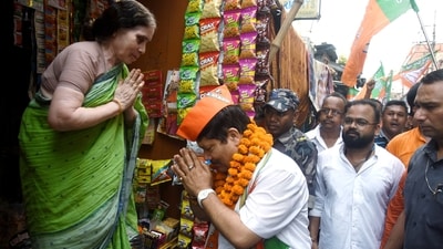 Bharatiya Janata Party (BJP) candidate from Barrackpore constituency, Arjun Singh greets people during his campaign rally, in North 24 Parganas, West Bengal. (ANI) Bharatiya Janata Party (BJP) candidate from Barrackpore constituency, Arjun Singh greets people during his campaign rally, in North 24 Parganas, West Bengal. (ANI)
