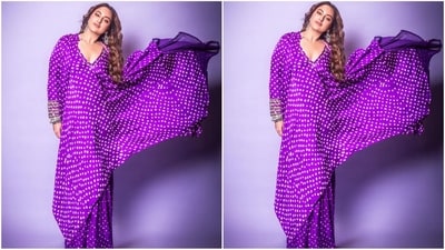Her outfit comes in an enchanting shade of purple and features a v-neck kaftan adorned with a trendy Bandhani print all over. She teamed it with a matching full-sleeved cape with sequin embroidery around the edges and a pair of flared trousers. (Instagram/@aslisona) Her outfit comes in an enchanting shade of purple and features a v-neck kaftan adorned with a trendy Bandhani print all over. She teamed it with a matching full-sleeved cape with sequin embroidery around the edges and a pair of flared trousers. (Instagram/@aslisona)