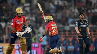 Punjab Kings' Shashank Singh (2R) and Harpreet Brar (L) celebrate their win. (AFP) Punjab Kings' Shashank Singh (2R) and Harpreet Brar (L) celebrate their win. (AFP)