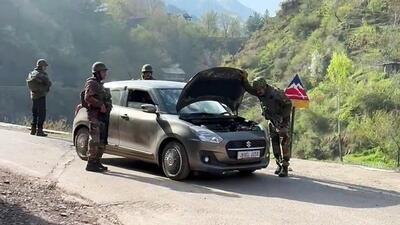 Indian army and Jammu and Kashmir Police personnel check a vehicle on a road after foiling an infiltration bid, at Sabura Nala in URI sector on Friday. (ANI) Indian army and Jammu and Kashmir Police personnel check a vehicle on a road after foiling an infiltration bid, at Sabura Nala in URI sector on Friday. (ANI)
