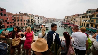 Venice gears up for a groundbreaking solution to combat overtourism with the introduction of a new access fee. (AP Photo/Luca Bruno, File) Venice gears up for a groundbreaking solution to combat overtourism with the introduction of a new access fee. (AP Photo/Luca Bruno, File)