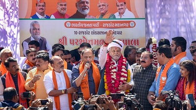 Rajkot: Union Minister and BJP candidate for Lok Sabha elections Parshottam Rupala during a roadshow, in Rajkot, Tuesday, March 5, 2024. (PTI Photo)(PTI03_05_2024_000167B) (PTI)