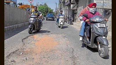 Potholes are prevalent in areas such as Dugri Phase 2, Pakhowal Road, Dhandran Road, Focal Point, Chandigarh Road, Jamalpur, Moti Nagar and Dashmesh Nagar. (HT Photo) Potholes are prevalent in areas such as Dugri Phase 2, Pakhowal Road, Dhandran Road, Focal Point, Chandigarh Road, Jamalpur, Moti Nagar and Dashmesh Nagar. (HT Photo)
