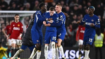 Chelsea's Cole Palmer celebrates scoring their fourth goal with Benoit Badiashile and Alfie Gilchrist. (REUTERS)