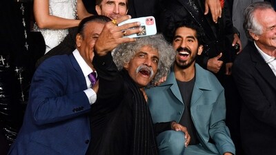 Actors Vipin Sharma, Makarand Deshpande, Sharlto Copley and Dev Patel arrive for the premiere. The film's plot revolves around a young guy who embarks on a quest to find the corrupt leaders responsible for his mother's death, ultimately becoming a rescuer of the poor and powerless people. (AFP) Actors Vipin Sharma, Makarand Deshpande, Sharlto Copley and Dev Patel arrive for the premiere. The film's plot revolves around a young guy who embarks on a quest to find the corrupt leaders responsible for his mother's death, ultimately becoming a rescuer of the poor and powerless people. (AFP)
