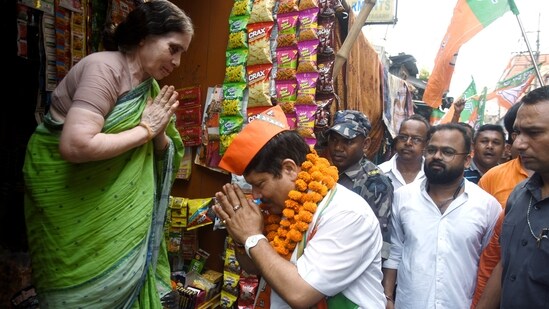 Bharatiya Janata Party (BJP) candidate from Barrackpore constituency, Arjun Singh greets people during his campaign rally, in North 24 Parganas, West Bengal.(ANI)