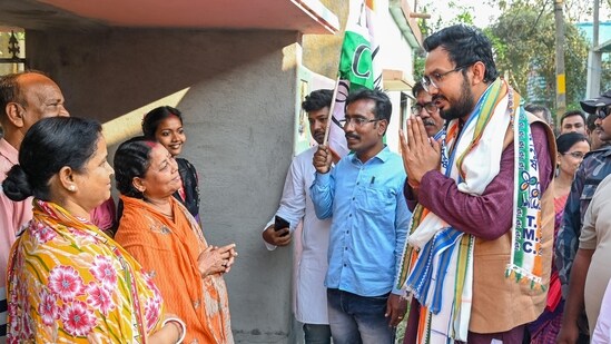TMC candidate from Ranaghat constituency, Mukut Mani Adhikari during a door-to-door campaign, in Nadia district, West Bengal.&nbsp;(PTI)