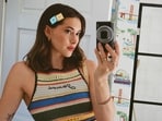 Madeleine White goes full Y2K with her iPod as hair clips and crochet top(Instagram)