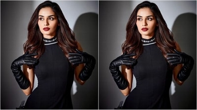 She accessorised her look with a diamond choker necklace, black elbow-length gloves and a pair of pump heels. With winged eyeliner, mascara-covered lashes, dark red lips and her hair left loose in a side part, she completed her head-turning look. (Instagram/@manushi_chhillar) She accessorised her look with a diamond choker necklace, black elbow-length gloves and a pair of pump heels. With winged eyeliner, mascara-covered lashes, dark red lips and her hair left loose in a side part, she completed her head-turning look. (Instagram/@manushi_chhillar)
