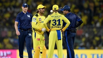 Chennai Super Kings' MS Dhoni (2L) and captain Ruturaj Gaikwad (2R) inspect the ball during the Indian Premier League (IPL) Twenty20 cricket match (AFP) Chennai Super Kings' MS Dhoni (2L) and captain Ruturaj Gaikwad (2R) inspect the ball during the Indian Premier League (IPL) Twenty20 cricket match (AFP)