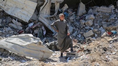 A Palestinian man looks on as he stands on the rubble in a devastated area around Gaza's Al-Shifa hospital on April 3, 2024, amid the ongoing conflict between Israel and the Palestinian Hamas militant group. (AFP) A Palestinian man looks on as he stands on the rubble in a devastated area around Gaza's Al-Shifa hospital on April 3, 2024, amid the ongoing conflict between Israel and the Palestinian Hamas militant group. (AFP)