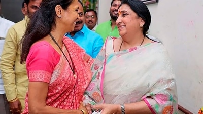 NCP leader Supriya Sule and Ajit Pawar's wife Sunetra Pawar meet at a temple in Baramati tehsil in Pune district on March 8, 2024. (PTI)