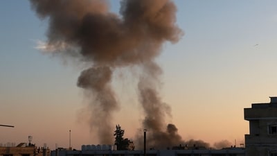 Visuals from the Israeli bombing in Deir el-Balah in the central Gaza Strip. (AFP) Visuals from the Israeli bombing in Deir el-Balah in the central Gaza Strip. (AFP)