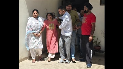 The distraught relatives of the victim at her house in Sunny Enclave, Kharar, on Saturday. The victim leaves behind her mother and two brothers. (HT Photo) The distraught relatives of the victim at her house in Sunny Enclave, Kharar, on Saturday. The victim leaves behind her mother and two brothers. (HT Photo)
